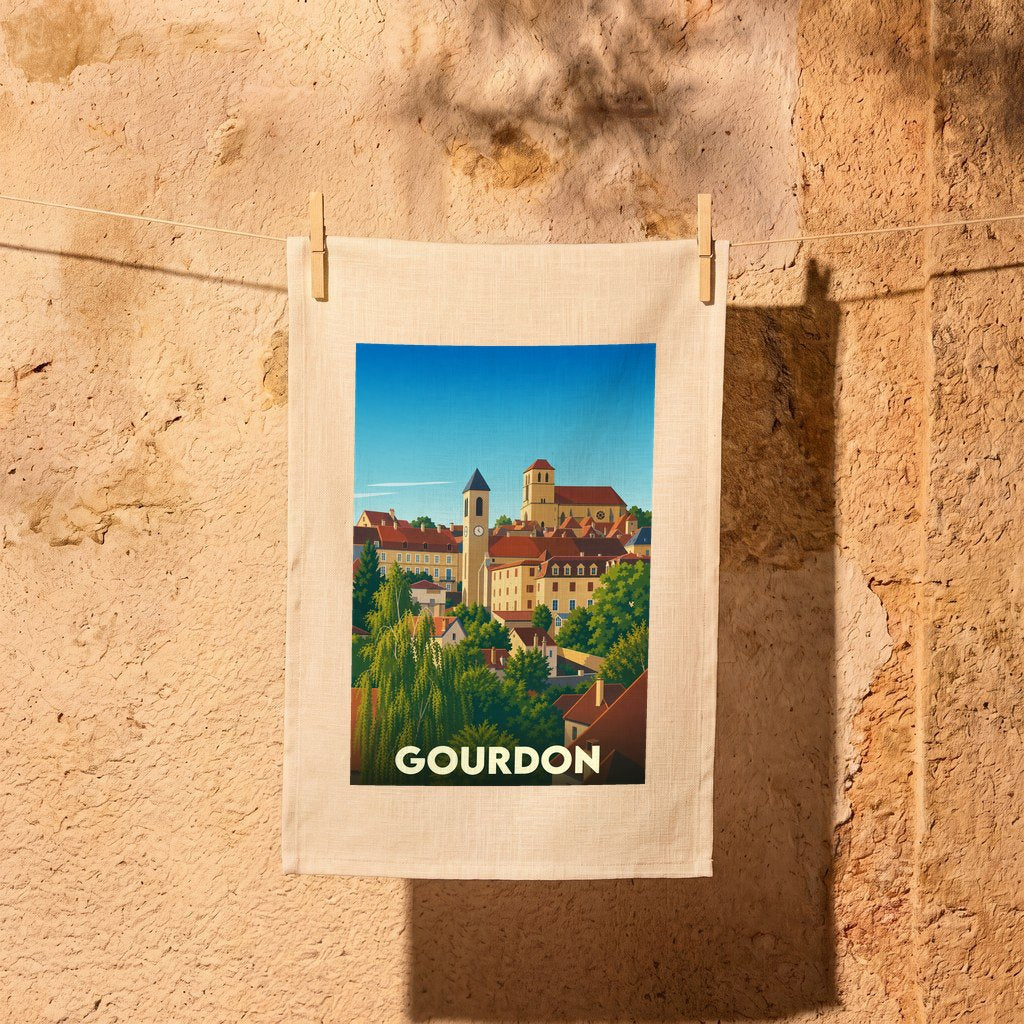 Torchon souvenir de la ville de Gourdon avec une illustration stylisée.
