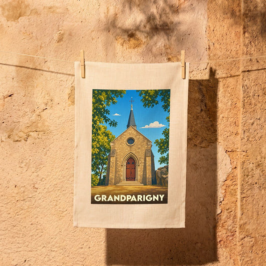 Torchon souvenir de la ville de Grandparigny avec une illustration stylisée de sa chapelle.