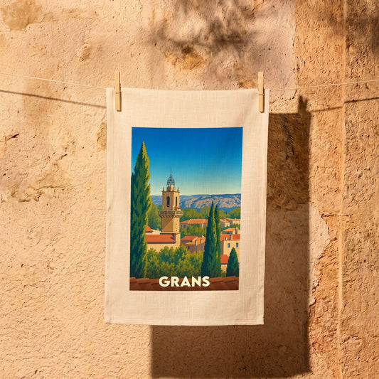 Torchon souvenir de la ville de Grans illustré d'un paysage provençal stylisé.