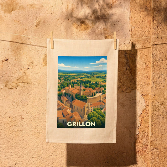 Torchon souvenir de la ville de Grillon illustré d'un paysage urbain stylisé.