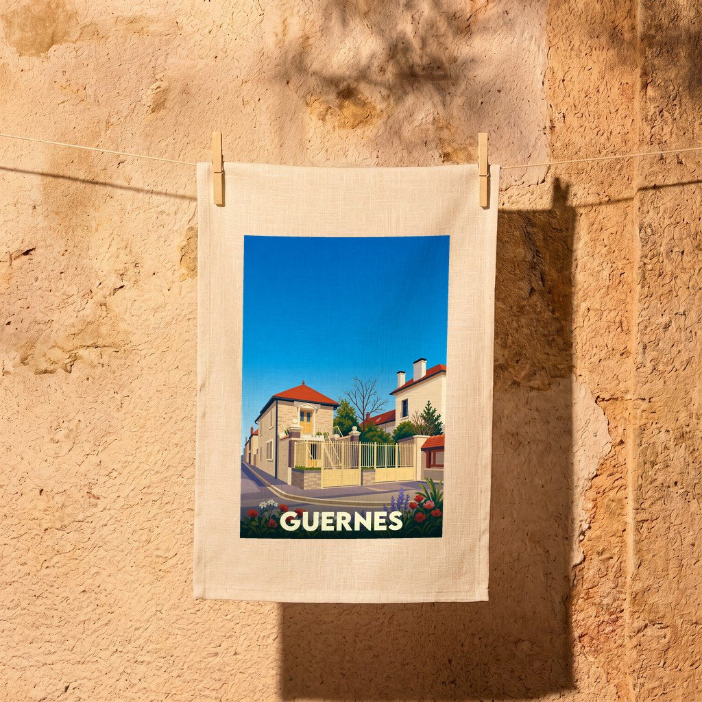 Torchon souvenir de la ville de Guernes avec une illustration stylisée.