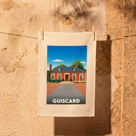 Torchon souvenir de la ville de Guiscard avec une illustration stylisée.