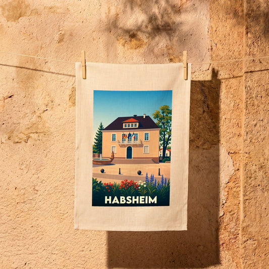 Torchon souvenir de la ville de Habsheim avec une illustration stylisée de son hôtel de ville.