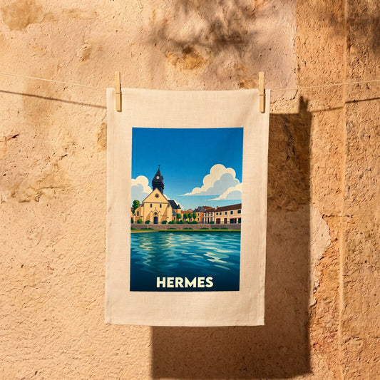 Torchon souvenir de la ville de Hermes orné d'une illustration stylisée de son église en bord de l'eau.