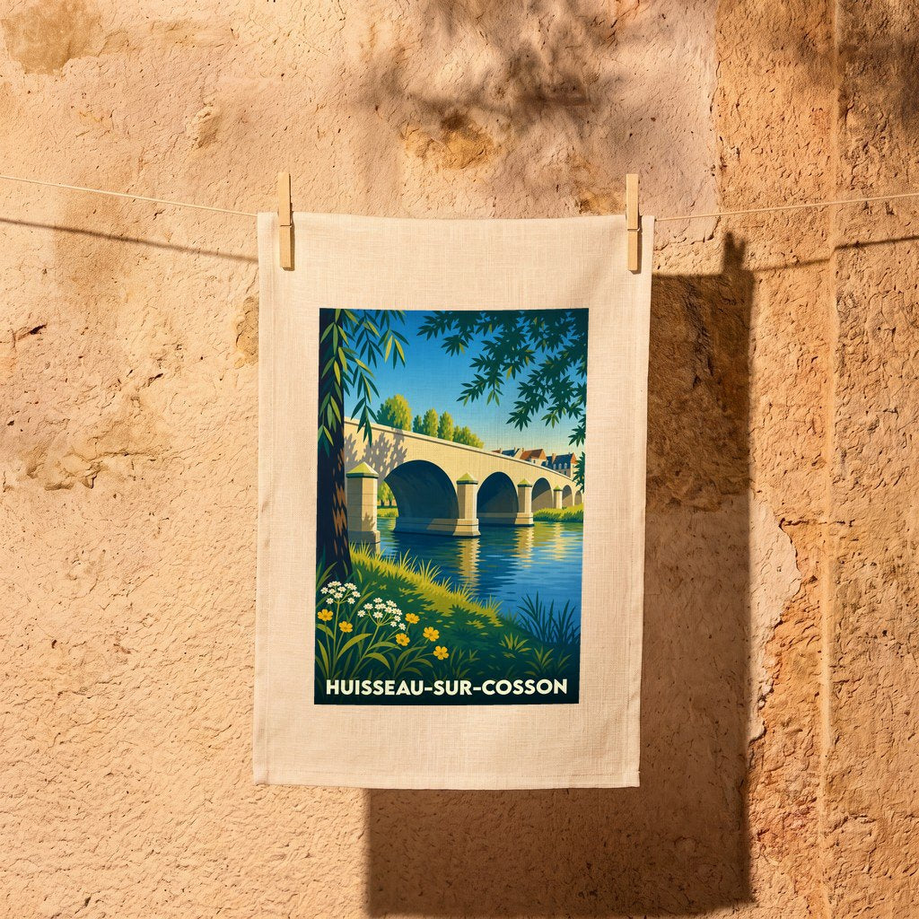 Torchon souvenir de la ville de Huisseau-sur-Cosson avec une illustration stylisée de son pont.