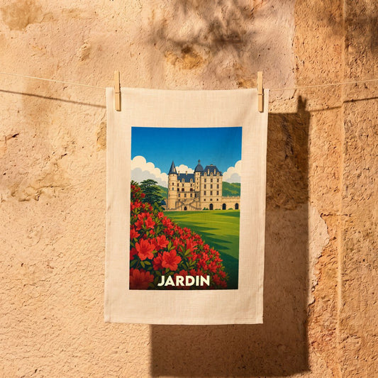 Torchon souvenir de la ville de Jardin illustré d'un château et d'un parterre de fleurs rouges.