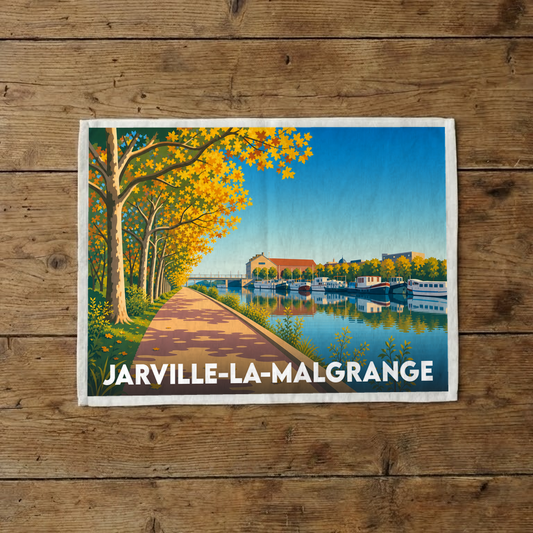 Torchon souvenir de la ville de Jarville-la-Malgrange illustrant un canal bordé d'arbres en automne.