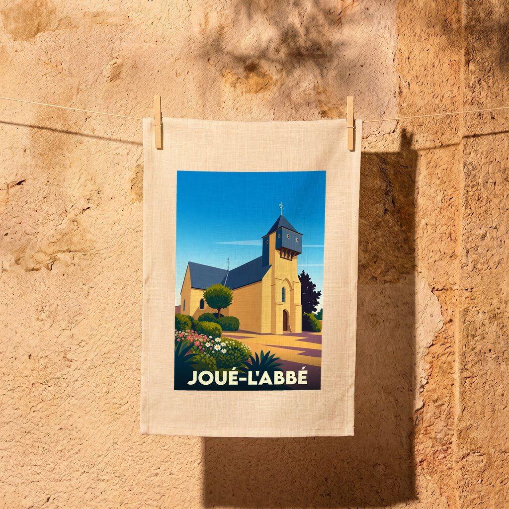 Torchon souvenir de la ville de Joué-l'Abbé avec une illustration stylisée de son église.