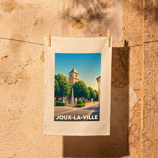 Torchon souvenir de la ville de Joux-la-Ville avec une illustration stylisée de son église et d'une place arborée.