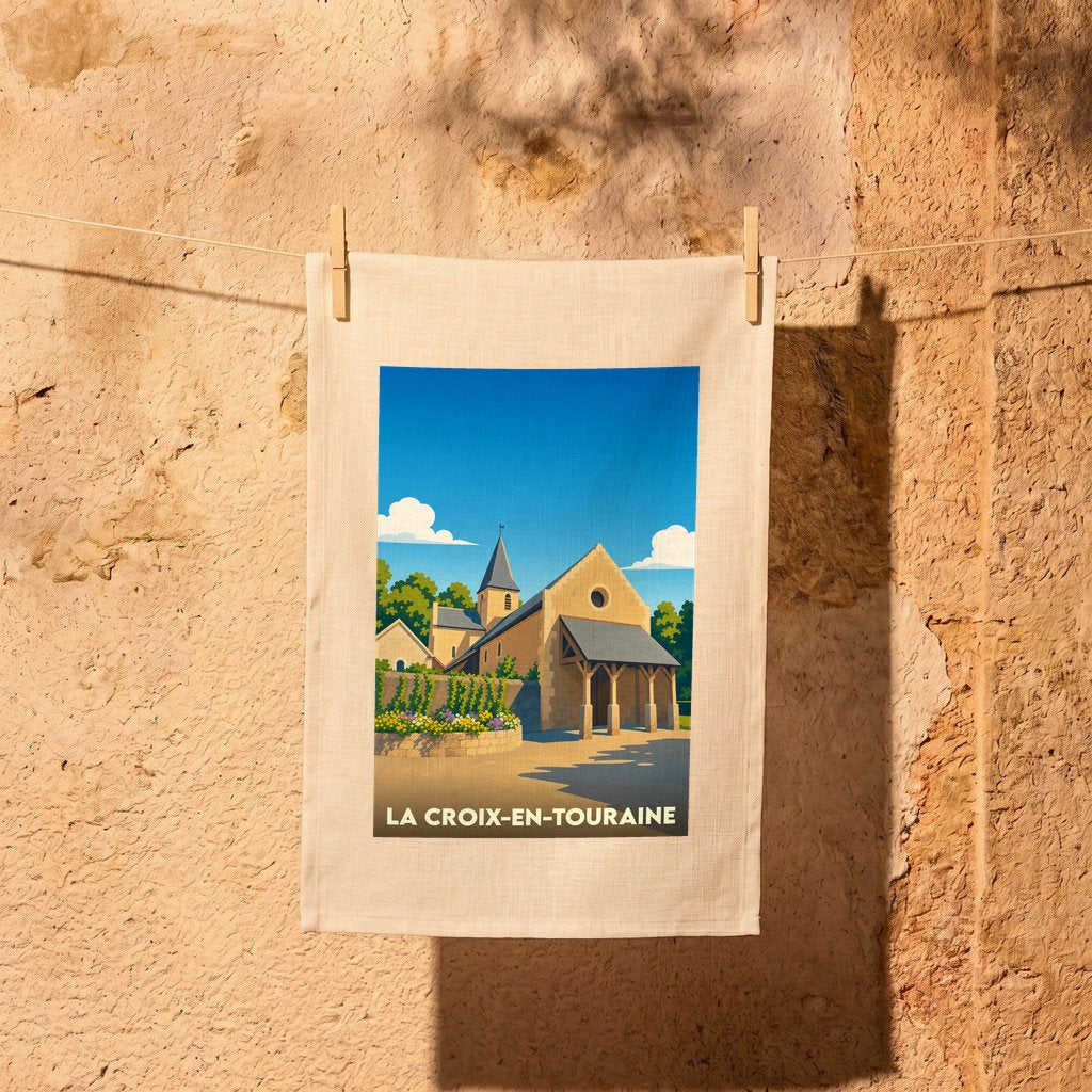 Torchon souvenir de la ville de La Croix-en-Touraine avec une illustration stylisée de son église.