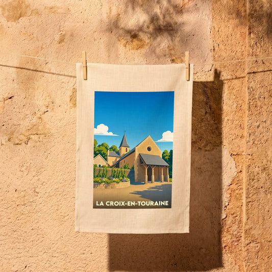 Torchon souvenir de la ville de La Croix-en-Touraine avec une illustration stylisée de son église.