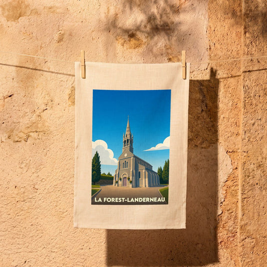 Torchon souvenir de la ville de La Forest-Landerneau avec une illustration stylisée de son église.