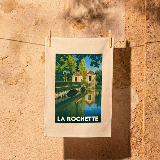 Torchon souvenir de la ville de La Rochette avec une illustration stylisée d'un pont et de ses pavillons.