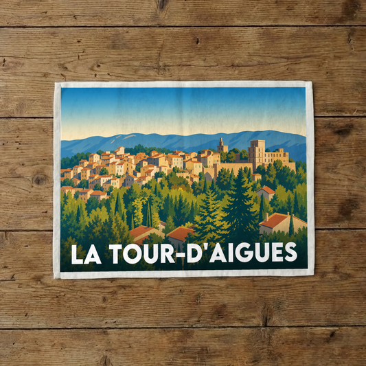 Torchon souvenir de la ville de La Tour-d'Aigues avec une illustration stylisée.