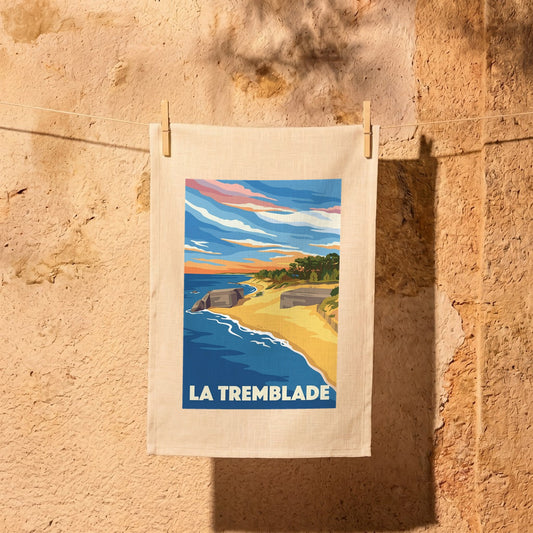 Torchon souvenir de la ville de La Tremblade avec une illustration stylisée représentant sa côte.