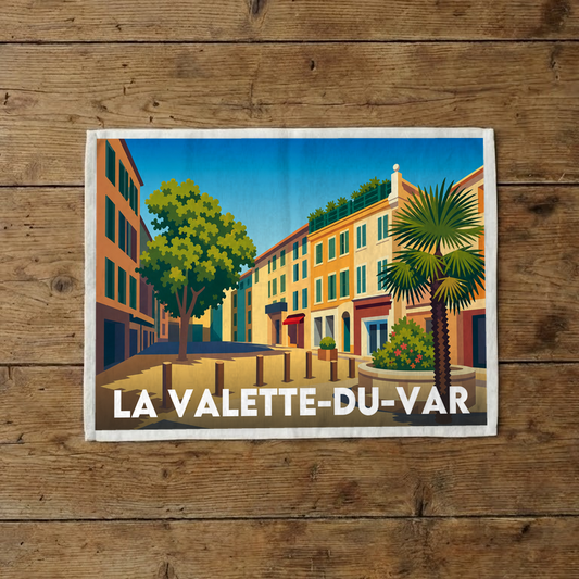 Torchon souvenir de la ville de La Valette-du-Var avec une illustration stylisée.