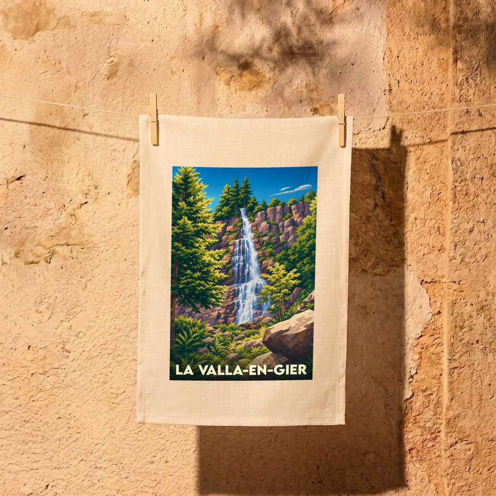 Torchon souvenir de la ville de La Valla-en-Gier illustré par une cascade au cœur d'une forêt.