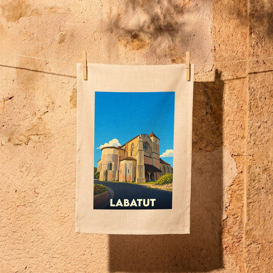 Torchon souvenir de la ville de Labatut orné d'une illustration stylisée de son église.