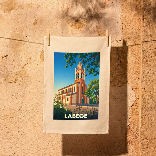 Torchon souvenir de la ville de Labège avec une illustration stylisée de son église.