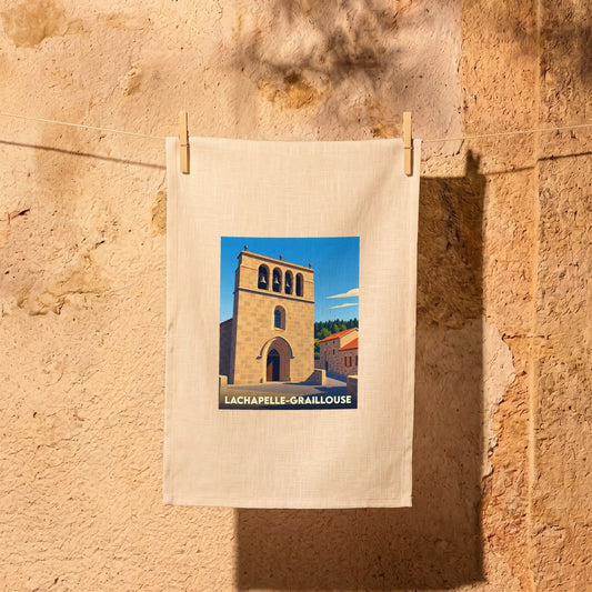 Torchon souvenir de la ville de Lachapelle-Graillouse avec une illustration stylisée de son église.
