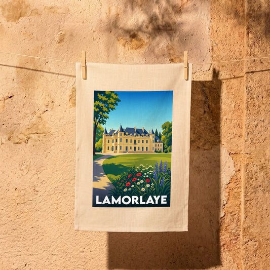 Torchon souvenir de la ville de Lamorlaye orné d'une illustration stylisée de son château.