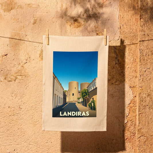 Torchon souvenir de la ville de Landiras avec une illustration stylisée.