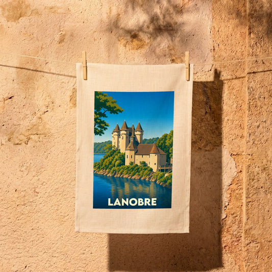 Torchon souvenir de la ville de Lanobre avec une illustration stylisée d'un château en bord de lac.