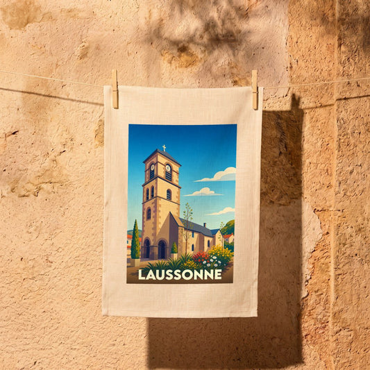 Torchon souvenir de la ville de Laussonne avec une illustration stylisée de son église.