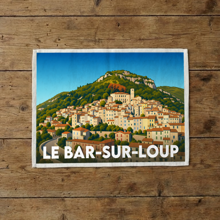 Torchon souvenir de la ville de Le Bar-sur-Loup avec une illustration stylisée du village perché.