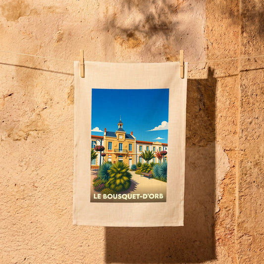 Torchon souvenir de la ville de Le Bousquet-d'Orb avec une illustration stylisée.