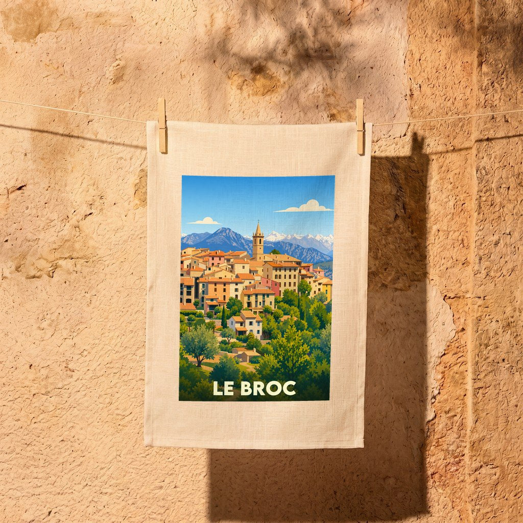 Torchon souvenir de la ville de Le Broc avec une illustration stylisée.