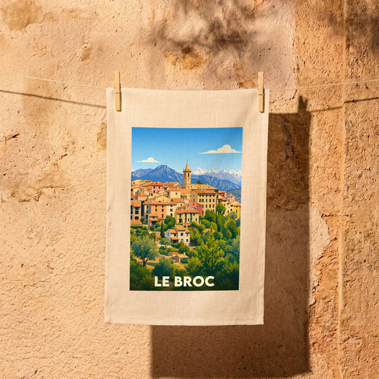 Torchon souvenir de la ville de Le Broc avec une illustration stylisée.