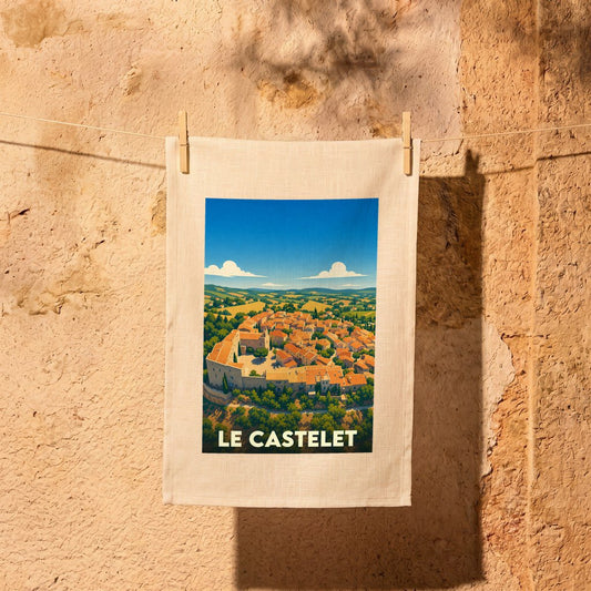 Torchon souvenir de la ville de Le Castelet avec une illustration stylisée.