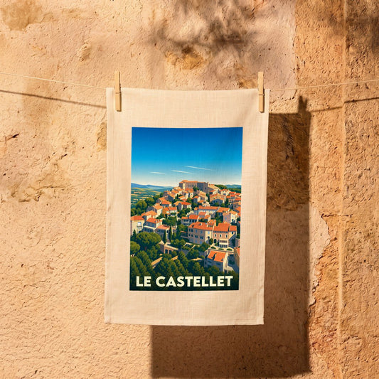 Torchon souvenir de la ville de Le Castellet avec une illustration stylisée.