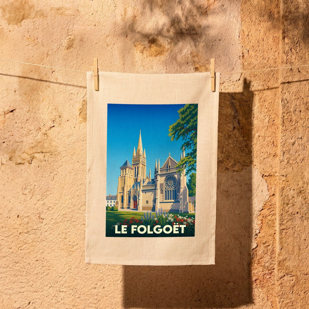 Torchon souvenir de la ville de Le Folgoët illustré d'une église de style gothique sous un ciel bleu.