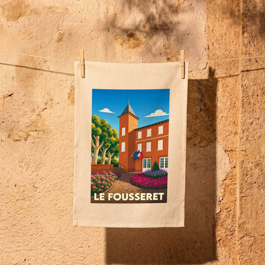 Torchon souvenir de la ville de Le Fousseret avec une illustration stylisée de sa mairie.
