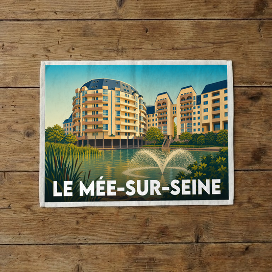 Torchon souvenir de la ville de Le Mée-sur-Seine avec une illustration stylisée de ses bâtiments et d'un jet d'eau.