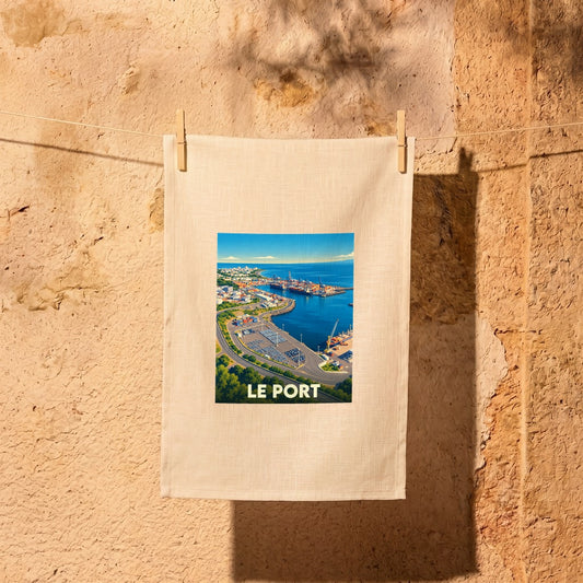 Torchon souvenir de la ville de Le Port avec une illustration stylisée de sa zone portuaire.