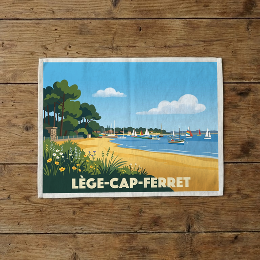 Torchon souvenir de la ville de Lège-Cap-Ferret avec une illustration stylisée.