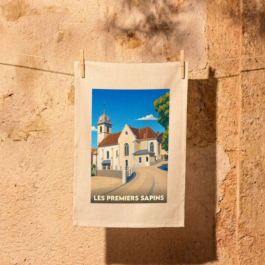 Torchon souvenir de la commune de Les Premiers Sapins avec une illustration stylisée de son église.