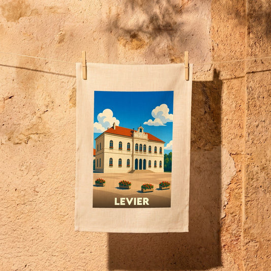 Torchon souvenir de la ville de Levier illustré par un dessin stylisé de son hôtel de ville.