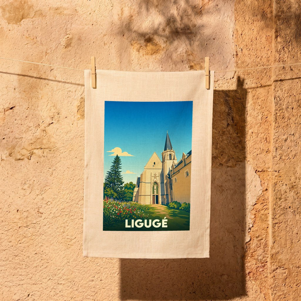 Torchon souvenir de la ville de Ligugé avec une illustration stylisée de son abbaye.
