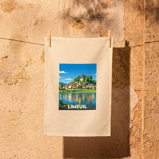 Torchon souvenir de la ville de Limeuil avec une illustration stylisée d'un village en bord de rivière.