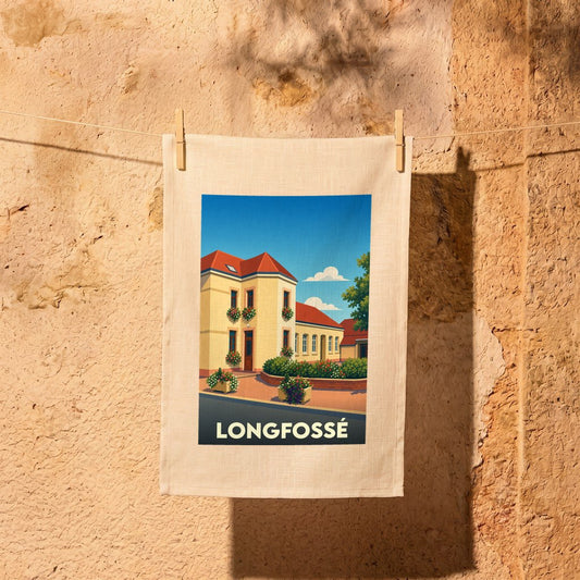 Torchon souvenir de la ville de Longfossé avec une illustration stylisée d'un bâtiment fleuri.