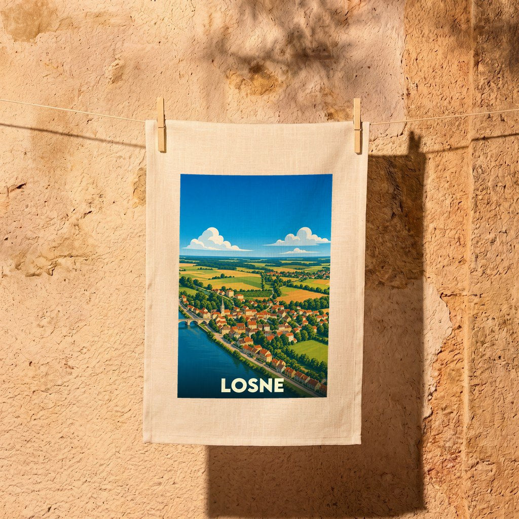 Torchon souvenir de la ville de Losne avec une illustration stylisée d'un paysage fluvial.