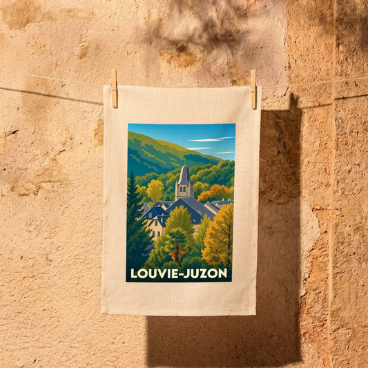 Torchon souvenir de la ville de Louvie-Juzon avec une illustration stylisée d'un paysage montagneux.