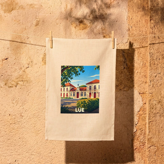 Torchon souvenir de la ville de Lüe avec une illustration stylisée.