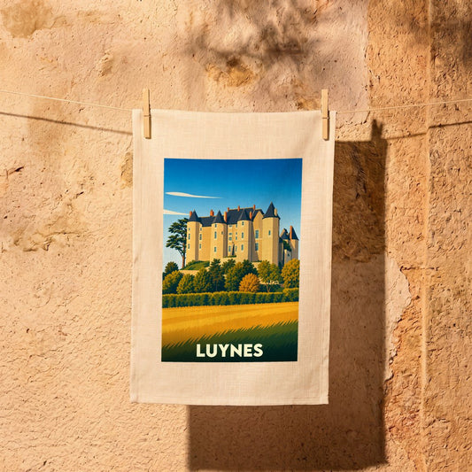 Torchon souvenir de la ville de Luynes orné d'une illustration stylisée de son château.