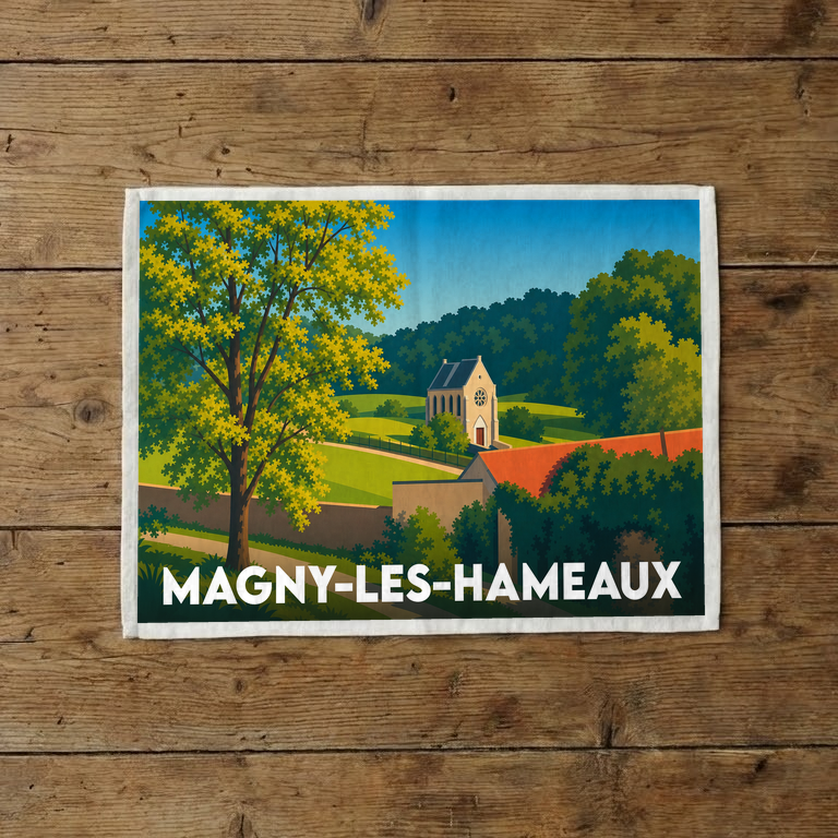 Torchon souvenir de la ville de Magny-les-Hameaux avec une illustration stylisée d'un paysage rural.