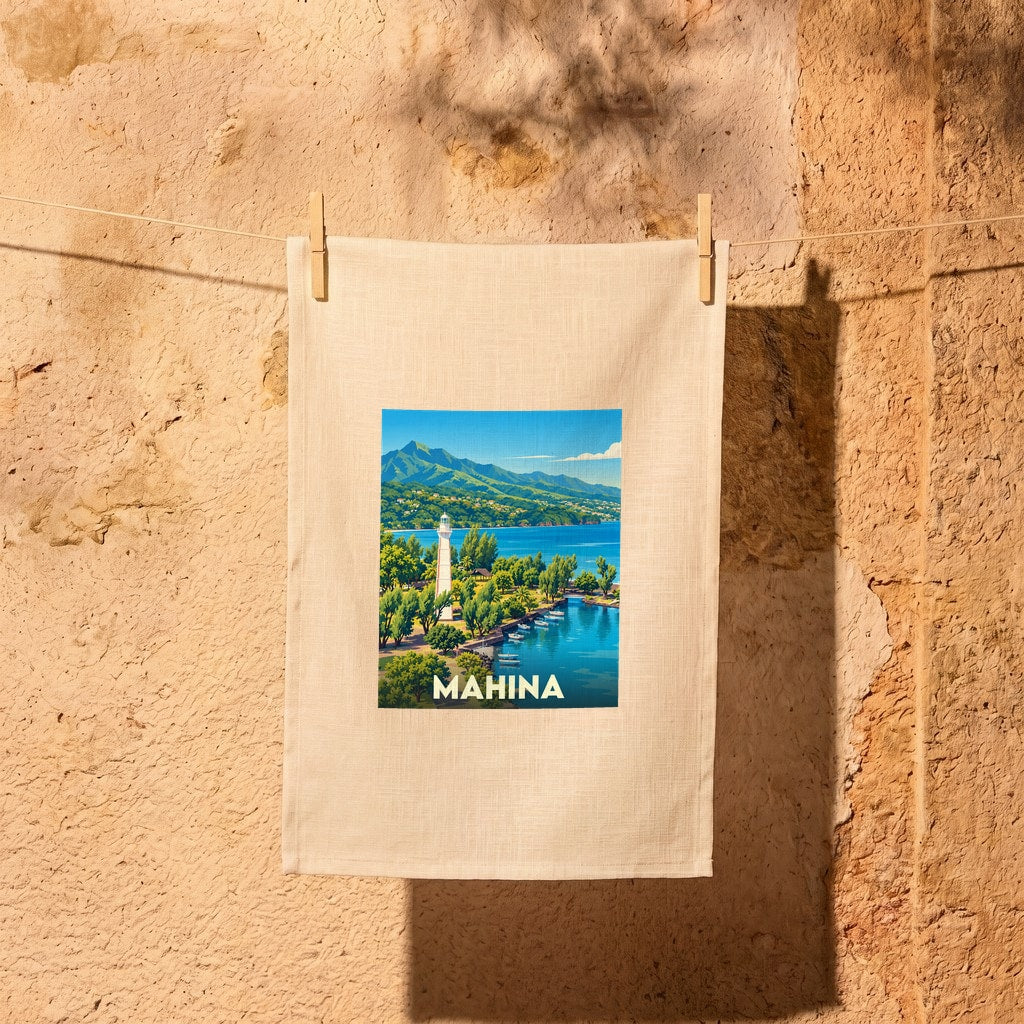 Torchon souvenir de la ville de Mahina illustré d'une vue stylisée sur son phare et la côte.